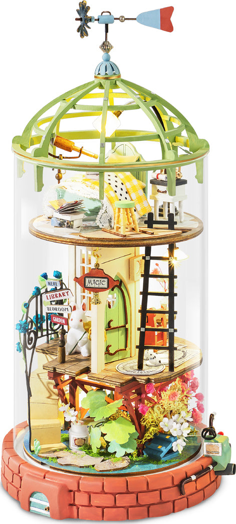 The Domed Loft Model Kit by Robotime features a whimsical three-tiered structure enclosed in a glass dome. Each tier showcases intricate details such as a green rooftop, tiny furniture, colorful flowers, and a whimsical weather vane, creating a charming and magical atmosphere for DIY enthusiasts.