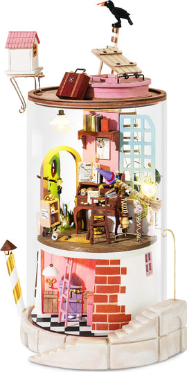 The Secluded Neighbor DIY Model Kit by Robotime is a beautifully crafted miniature model that features intricate details, including a cozy interior with furniture, books, and decor. It has a whimsical design with a small house on top, stairs, and a crow perched atop. The entire setup is enclosed in a clear cylindrical structure, showcasing the various levels and elements of the model.