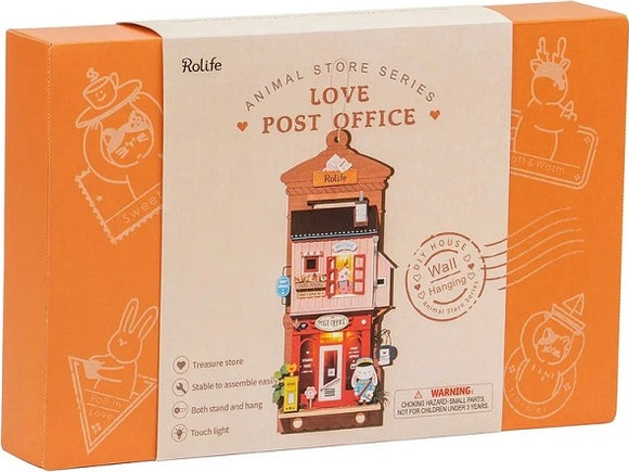 The Love Post Office DIY kit by Robotime features a whimsical design resembling a post office housing adorable animal characters. The kit includes components for building a charming treasure store that can be displayed as a wall hanging or a stand-alone piece. Perfect for crafting enthusiasts, it allows for a delightful and creative assembly experience.