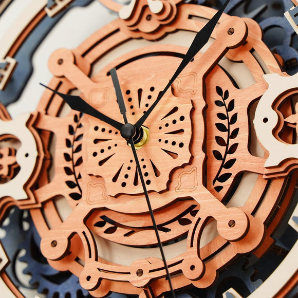 Close-up view of the Romantic Notes Wall Clock by Robotime, showcasing intricate wooden details and gears. The clock features a layered design with a combination of natural wood tones, decorative cutouts, and black clock hands against a beige background. Perfect for adding a charming and artistic touch to any home decor.