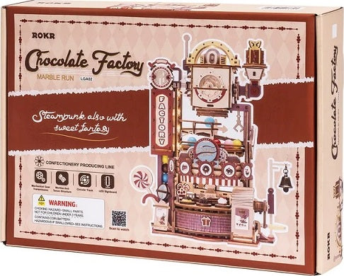 The Chocolate Factory Marble Run Model Kit by Robotime showcases a whimsical steampunk design, featuring intricate details like candy machines, gears, and a factory backdrop. The kit emphasizes creativity and hands-on construction, ideal for DIY enthusiasts. Perfect for both adults and children, it offers a delightful building experience that results in a charming marble run display.