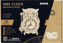 The Owl Clock 3D Build Kit by Robotime showcases a beautifully designed mechanical clock featuring intricate gears and an owl motif. This DIY kit offers self-assembly and includes a pendulum escapement and event timer. The packaging displays detailed instructions and emphasizes the precision of quartz movement. Ideal for craft enthusiasts and those fond of mechanical puzzles.