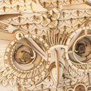 Close-up of the Owl Storage Box 3D Build Kit by Robotime, showcasing intricate wooden pieces with detailed engraving, including the owl's eyes and feathers, perfect for DIY enthusiasts.