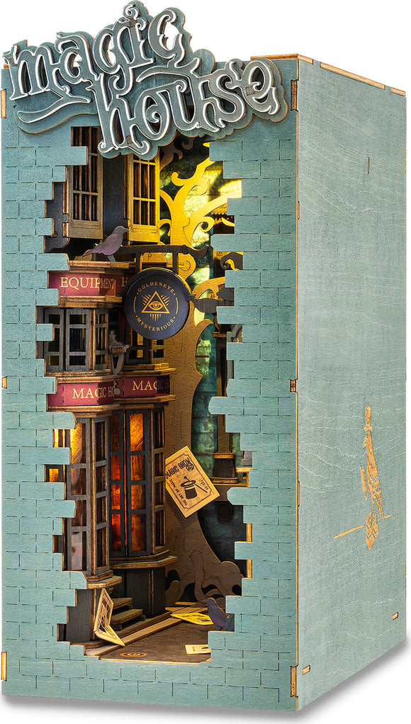 The Magic House DIY Book Nook by Robotime is a beautifully designed miniature scene showcasing a whimsical shop. The intricate wooden structure features vibrant colors and charming details, including windows with illuminated interiors, a magical sign, and decorative elements that create a cozy, enchanting atmosphere. Perfect for DIY enthusiasts, this kit allows for creative assembly and adds a delightful touch to any bookshelf.