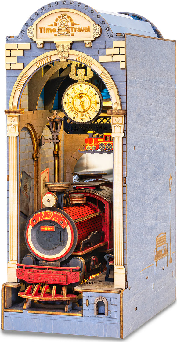 The Time Travel DIY Book Nook by Robotime is a detailed miniature construction kit featuring a vintage train station scene. The intricately designed facade showcases a red steam locomotive, vintage clock, and decorative archways, inviting enthusiasts into a whimsical world of creativity and nostalgia.