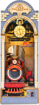 A beautifully crafted diorama of a time travel station featuring a red steam locomotive, intricate wooden details, and a clock with Roman numerals. The scene includes a welcoming sign, vintage benches, and decorative lights, making it an inviting and imaginative DIY project. Perfect for enthusiasts of model building and artistic displays.