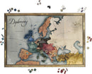 The game Diplomacy by Avalon Hill Hasbro features a strategic board depicting a map of Europe. Different colors represent various powers and territories, accompanied by game pieces scattered around the edges, highlighting the interactive nature of this classic strategic game.