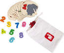 A colorful I Learn to Count Puzzle by Janod featuring large, wooden number pieces from 1 to 10, including an elephant illustration. The puzzle comes with a sturdy storage bag, making it perfect for engaging young children in learning to count through play.
