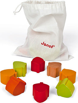 The Nutty Balance Balancing Game by Janod features colorful wooden pieces designed in various shapes, arranged around a white drawstring bag. The game encourages dexterity and balance as players take turns stacking the pieces without toppling them. Perfect for developing fine motor skills and providing fun for all ages.