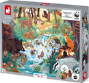Footprint Seek & Find Puzzle by Janod featuring a vibrant woodland scene filled with various wildlife including deer, foxes, and a flowing stream. The puzzle contains 81 pieces and is suitable for children aged 5 and up. The box highlights its eco-friendly production and WWF partnership for creating sustainable toys.