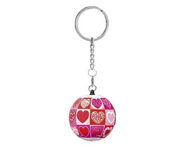 A colorful Love Puzzle Keychain by Pintoo featuring a jigsaw design with heart patterns in shades of red and pink. The keychain has a circular shape, showcasing a collage of various heart illustrations, connected to a metal keyring for easy attachment to bags or keys.