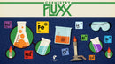 Chemistry Fluxx game by Looney Labs features colorful illustrations of laboratory equipment and periodic table elements, including beakers, test tubes, and flames, set against a dark blue background with molecular motifs.