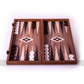A beautifully crafted 19-inch oak replica backgammon set with side rails. The board features a striking design with dark and light wood accents, showcasing the classic triangular pattern. Included are round playing pieces in black and white, positioned on the board, ready for gameplay. The set is both elegant and functional, ideal for game enthusiasts and collectors.
