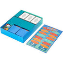 A vibrant blue game box for Balderdash by Mattel, featuring an organized interior with cards, dice, playing pieces, and a scoring board labeled 'Start' and 'Finish.' The game encourages creativity and laughter among players, making it a perfect choice for family game night.