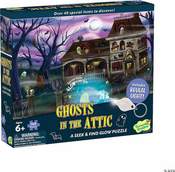 Ghosts in the Attic Jigsaw Puzzle by MindWare, featuring a spooky scene with ghosts, bats, and a haunted house. The box highlights that it includes a reveal light to illuminate special items within the puzzle. Suitable for ages 6 and up. Contains 100 pieces.