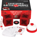 Shashibo Battle Shapes 2-pack featuring two mechanical puzzle cubes, an hourglass timer, a bell, and a deck of challenge cards. The packaging emphasizes a brainy battle with captivating design elements in red and black, suitable for ages 8 and up.