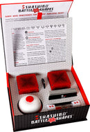 Shashibo Battle Shapes 2-pack featuring two mechanical puzzle cubes, a red and white bell, cards for gameplay, and an instruction booklet. The packaging displays instructions for various play modes including solo and 2-player duel, encouraging creativity and competition.