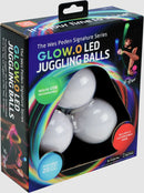 The Wes Peden Signature Series Glow.O LED Juggling Balls package featuring three white juggling balls. The box highlights features such as micro USB rechargeability, 20 different light modes, and a customizable mode. Colorful graphics and images of a juggler enhance the appeal of the product, inviting users to brighten their juggling experience.