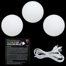 Three white Wes Peden LED juggling balls from Fun in Motion Toys, accompanied by a USB charging cable and an informational card about the product's features and usage.