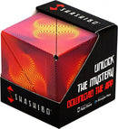 Shashibo Optical Illusion by Geobenders is a mechanical puzzle featuring vibrant, mesmerizing patterns that create an optical illusion. The cube is designed for interactive play, where users can transform it into multiple shapes, enhancing creativity and engagement. The packaging highlights the app download option, adding a modern twist to the play experience.