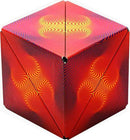 Shashibo Optical Illusion by Geobenders is a mechanical puzzle that transforms into various shapes. Its vibrant red and yellow patterns create mesmerizing optical illusions, engaging the mind and enhancing spatial awareness.