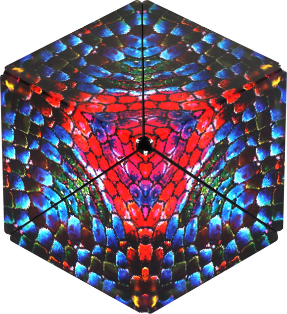 Shashibo The Chameleon by Geobenders is a colorful mechanical puzzle featuring a vibrant, multi-colored design inspired by chameleons. The puzzle has a hexagonal shape and intricate patterns that change as it's manipulated, providing an engaging tactile experience.