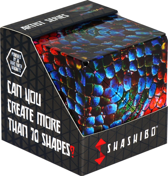 The Shashibo The Chameleon is a mechanical puzzle designed to create over 70 unique shapes. The product features a vibrant, eye-catching design with an array of blue, red, and green colors resembling a chameleon's skin. It is made with 36 rare-earth magnets, allowing for endless creativity and fun.