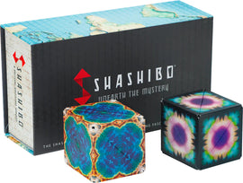 Shashibo Earth & Moon 2-pack mechanical puzzle set by Geobenders, featuring vibrant geometric designs. The puzzle cubes are presented beside an illustrated box that showcases an intricate map design, enticing users with the promise of transforming the cubes into various shapes and patterns.