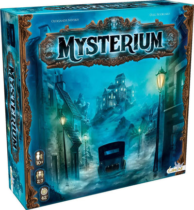 Mysterium board game box featuring a mysterious, atmospheric scene with a foggy street, an old-style car, and a haunting mansion in the background. The artwork emphasizes a captivating detective theme, inviting players to delve into a world of mystery and collaboration.