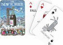 Deck of Have A Drink Playing Cards by New York Puzzle Company featuring artistic illustrations. Includes various cards such as a wine glass, a bottle of champagne, and a Swiss army knife. The design offers a whimsical take on drinking themes, perfect for game nights and collectors.