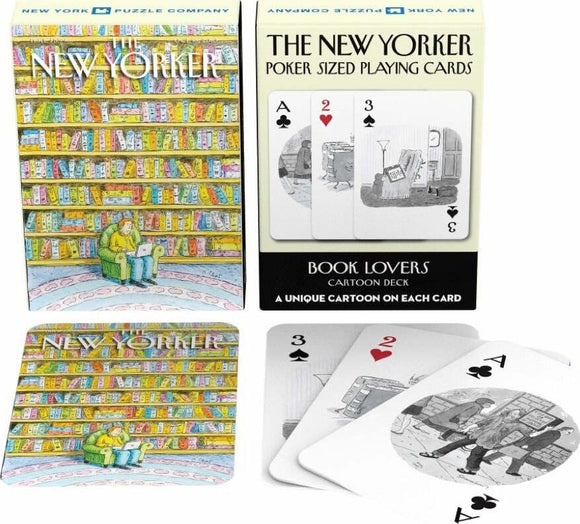 A deck of Book Lover Playing Cards by New York Puzzle Company, featuring colorful illustrations on the packaging and unique cartoons on each card. The box shows a cozy library scene with a person seated in a green armchair. A few cards are displayed, highlighting illustrations that showcase book-themed artwork.