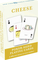 A box of Cheese Playing Cards by New York Puzzle Company showing several playing cards depicting different types of cheese, including illustrations and poker card values. The box is designed in a bright color scheme with 'Cheese' and 'Poker-Sized Playing Cards' prominently displayed.