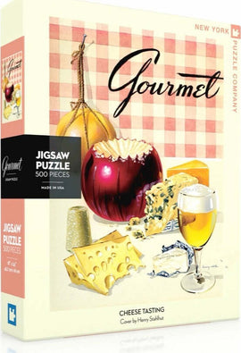 The Cheese Tasting Puzzle box featuring an illustration of various cheeses, a glass of beer, and a checkered background. It is a 500-piece jigsaw puzzle made by New York Puzzle Company. The cover art is by Henry Stahlhut.