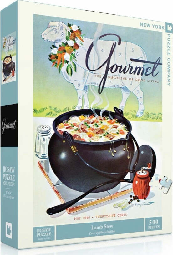 A box of the Lamb Stew Gourmet Puzzle, featuring a nostalgic illustration of a pot of stew with vegetables, on a wooden table. The design includes a whimsical sheep in the background along with the text 'Gourmet: The Magazine of Good Living'. The puzzle contains 500 pieces and is produced by New York Puzzle Company.