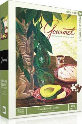 500-piece jigsaw puzzle titled 'Avocados and Tortillas' by New York Puzzle Company. The puzzle features a vintage Gourmet magazine cover from April 1952, showcasing a vibrant still life of avocados, tortillas, and traditional Mexican decor, with lush green leaves and an artistic background.