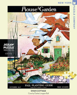 A beautifully illustrated jigsaw puzzle titled 'Swan Cottage' featuring a charming cottage surrounded by vibrant flowers and flying swans. The puzzle has 1000 pieces and highlights a nostalgic design from the October 1917 issue of House & Garden, illustrated by Charles Livingston Bull. The packaging showcases lush greenery and a serene water path, ideal for puzzle enthusiasts.