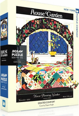Quilted Comfort Puzzle by New York Puzzle Company featuring a vibrant illustration of a cozy bedroom with a patchwork quilt, window view, and ornamental details. The jigsaw puzzle consists of 500 pieces and is designed for ages 13 and up, encouraging creativity and relaxation.