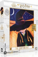 The Sorting Hat Harry Potter Puzzle (500 pieces) by New York Puzzle Company. The box features vibrant artwork of the Sorting Hat against a starry night sky, capturing the magic of the Wizarding World.