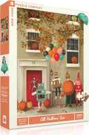 All Hallows' Eve 1000-piece jigsaw puzzle by New York Puzzle Company featuring a whimsical Halloween scene. The image depicts a festive group of characters dressed in costumes, including a robot, a pumpkin, and a skeleton, set against a background of a charming house adorned with pumpkins and colorful balloons, capturing the spirit of Halloween.