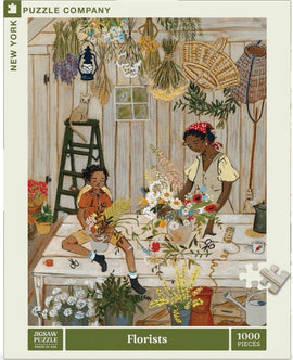 A colorful jigsaw puzzle by New York Puzzle Company titled 'Florists'. It features two children working in a bright florist's workshop adorned with flowers and plants, illustrating a warm, creative atmosphere. The scene includes various floral arrangements, scissors, and containers, with a playful cat in the background.