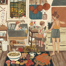 A vibrant jigsaw puzzle titled 'Summer Abundance' depicting a warm kitchen scene. A mother and two children interact in the kitchen, with one child playing in a sink full of water and another helping to prepare food. Fresh produce, pots, and flowers decorate the scene, capturing the essence of summer warmth and family togetherness.