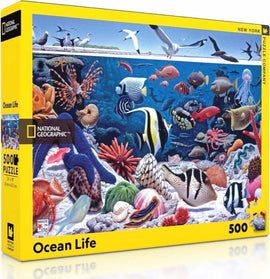 The Ocean Life Puzzle by New York Puzzle Company features a vibrant underwater scene filled with various sea creatures such as colorful fish, starfish, jellyfish, and corals, making it an engaging 500-piece jigsaw puzzle. The box is bright yellow and prominently displays the National Geographic logo, showcasing the intricate marine life illustration on the front.