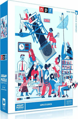 NPR Studios jigsaw puzzle by New York Puzzle Company featuring a vibrant illustration of a radio studio. The artwork depicts diverse characters engaged in various activities related to broadcasting, with bright colors and intricate details. The puzzle consists of 500 pieces and comes in a sturdy, decorative box.