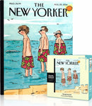 The Trunk Show Mini jigsaw puzzle by New York Puzzle Company features a colorful illustration inspired by The New Yorker magazine. The puzzle box displays a beach scene with four characters wearing vibrant floral swimsuits, set against a sunny ocean background, reminiscent of the cover art from August 25, 2014. Perfect for puzzle enthusiasts and art lovers.