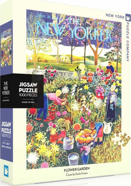 A colorful 1000-piece jigsaw puzzle titled 'Flower Garden' by New York Puzzle Company, featuring vibrant illustrations of a garden scene with people tending flowers, trees, and a serene landscape. The puzzle's box displays a cover art created by Ilonka Karasz.