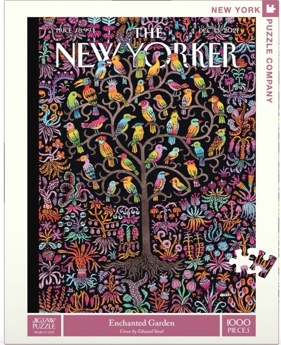 The Enchanted Garden jigsaw puzzle by New York Puzzle Company features a vibrant illustration of a tree filled with colorful birds surrounded by intricate flowers and foliage. The design is bold and whimsical, emphasizing a magical garden theme, with a dark background that enhances the bright colors.