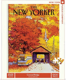A 1000-piece jigsaw puzzle featuring a vibrant illustration of a covered bridge surrounded by autumn trees in shades of orange and yellow. The scene includes a bus labeled 'Charter,' people walking, and a charming rural setting, evoking nostalgia and warmth. The artwork is by Arthur Getz, featured on the cover of The New Yorker magazine from October 19, 1981.
