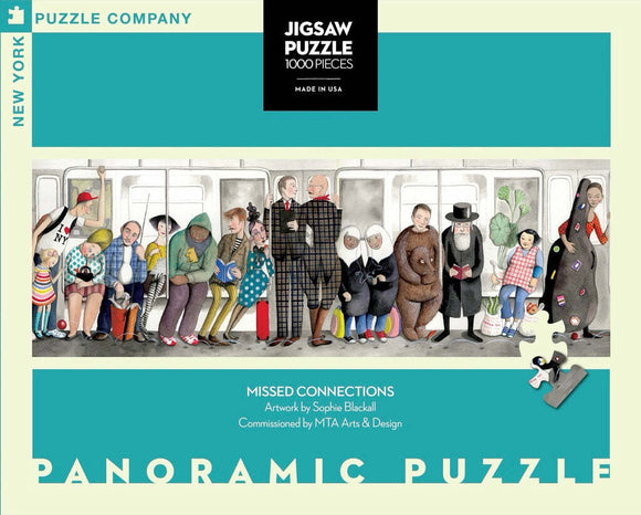 A panoramic jigsaw puzzle featuring the vibrant illustration by Sophie Blackall, depicting diverse characters on a subway. The scene captures various personalities, including individuals in eclectic attire, a bear reading, and an assortment of bags and items, celebrating urban life and missed connections.
