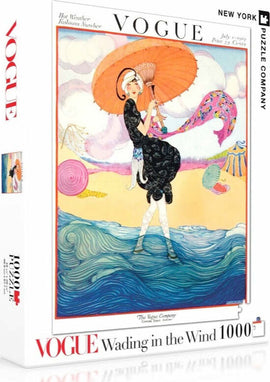 A beautifully illustrated jigsaw puzzle box featuring a vintage Vogue magazine cover. The image depicts a fashionable woman in a black dress holding a large orange parasol, standing in front of vibrant waves and beach elements. This 1000-piece puzzle offers a nostalgic touch of fashion art, perfect for puzzle enthusiasts and collectors.