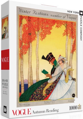 New York Puzzle Company's Autumn Reading jigsaw puzzle featuring vintage Vogue fashion illustration. The box displays an elegantly dressed couple reading amidst vibrant autumn trees and serene waters. The puzzle contains 1000 pieces, perfect for cozy fall nights.
